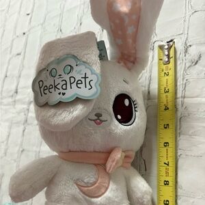Peekapets Interactive Bunny plush toy.